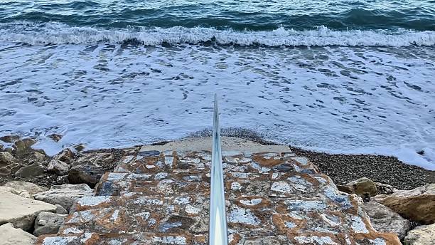 istock A Coastal Pathway awaits, inviting you to experience stunning turquoise waves and views 2234741645