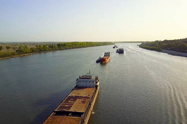 istock cargo barge floats along the river. Cargo ship. 2234750834