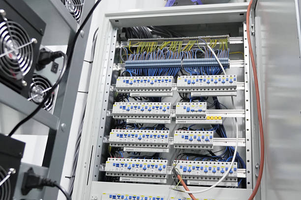 istock working server. Internet wires and flashing lights on the server. 2234750852