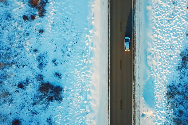istock Car rides on a bridge over ravine, view from above. 2234750860