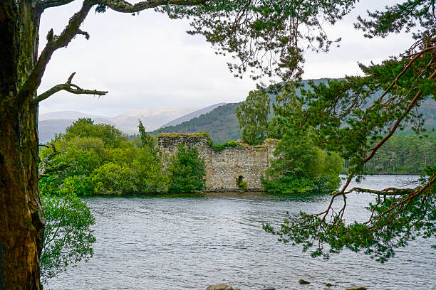 Loch an Eilen in Scotland with its ruined castle on the island