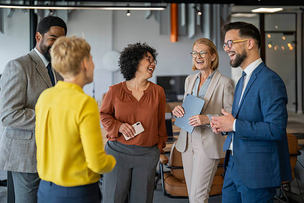 istock Diverse business team sharing a laugh in modern office 2234756102