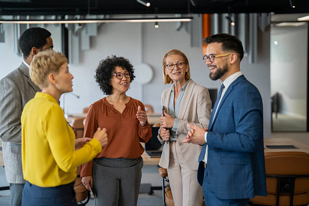 istock Business people talking during informal meeting in modern office 2234756112