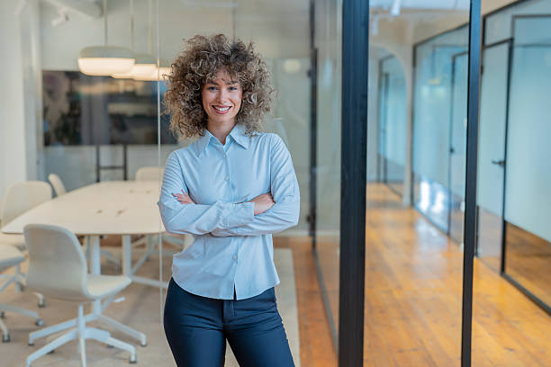istock Young businesswoman smiling with confidence in modern office 2234756466