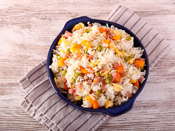 istock Yangzhou fried rice with egg, ham, peas and carrot 2234771337