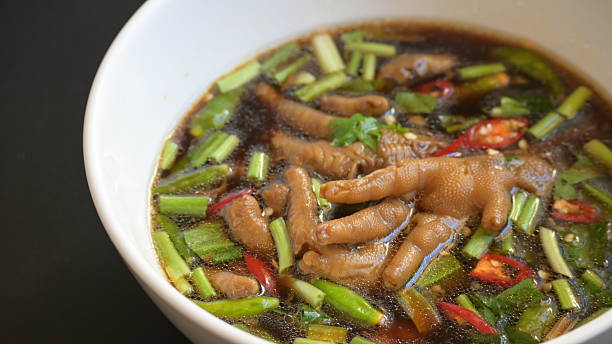 istock spicy chicken soup with chilli, Thai food 2234772448
