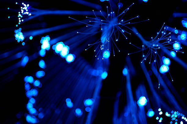 istock Abstract background of optical fiber cable (blue) 2234774914