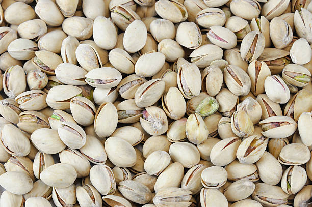 istock fresh roasted pistachio as food background 2234775284