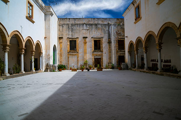 istock Exploring a historic courtyard in Italy with stunning architecture and vibrant greenery 2234776554