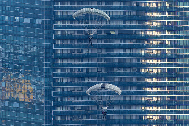 Naval divers parachuted into the Marina Bay during the Singapore 60th National Day celebration.