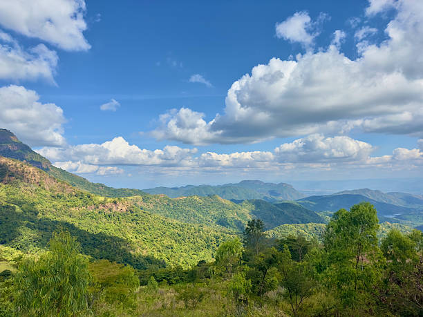 istock view of mountain and forest with cloudy sky 2234791831