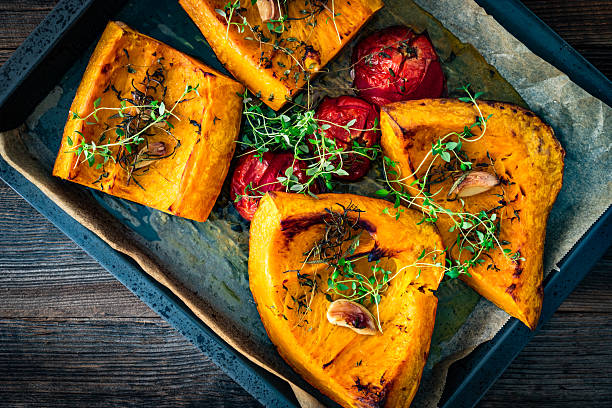 istock Baked pumpkin with thyme and garlic on baking paper 2234793485