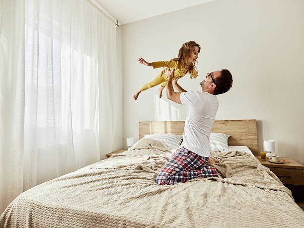 istock Daddy, I'm flying like an airplane! 2234800017