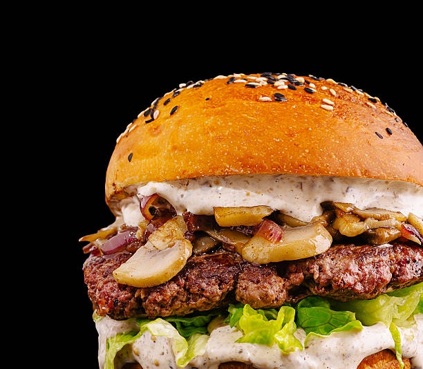 istock Juicy mushroom and beef burger served on sesame seed bun with fresh toppings 2234800932