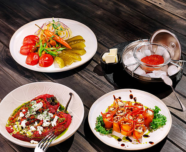 istock Variety of colorful dishes served at a rustic dining table 2234800949