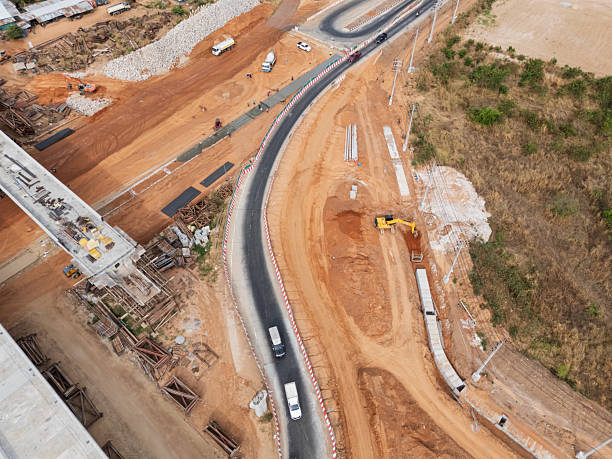istock The construction site before the construction of the concrete bridge over the intersection by crane workers, tractors, and backhoes 2234801912