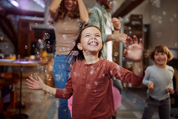 istock Happy little girl having fun while dancing at home. 2234802185