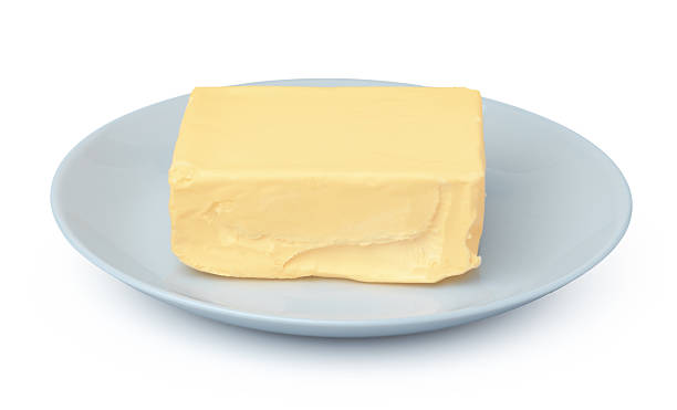 istock Butter on white plate isolated on white background 2234804730