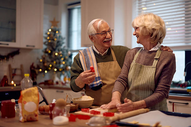 istock Happy senior couple having fun while baking for Christmas holidays. 2234805627