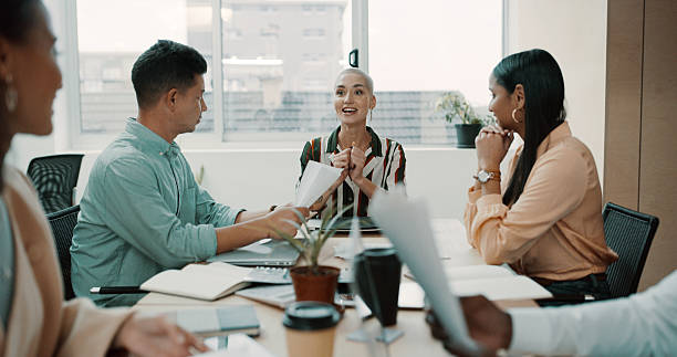 istock Meeting, documents and business people in office for planning with creative project in collaboration. Discussion, paperwork and team of editors with article for publishing in workplace boardroom. 2234806002