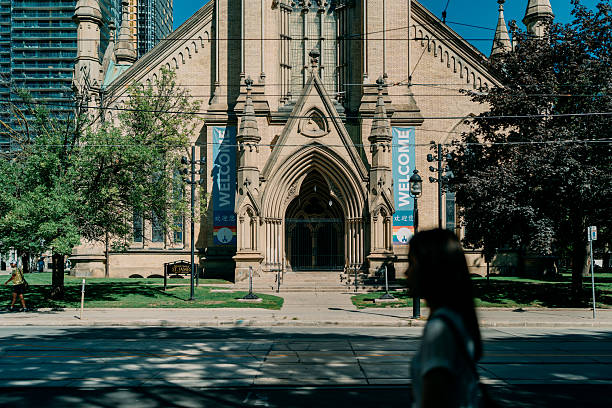 Historic St. James Cathedral in Toronto, Canada, featuring its iconic Gothic Revival architecture. A landmark church in the heart of downtown, surrounded by urban life and cultural heritage.