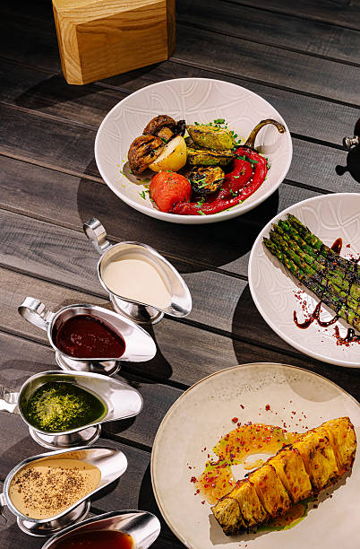 istock Enjoy grilled veggies and sauces at a modern dining spot 2234809906