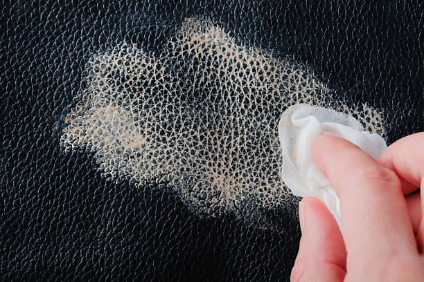 istock Cleaning a cosmetic stain from leather material 2234811860