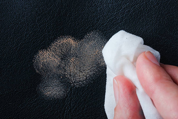 istock Cleaning a cosmetic stain from leather material 2234812425
