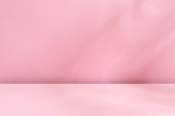 istock Minimal abstract gentle light pink background with aesthetic light and shadows 2234814461