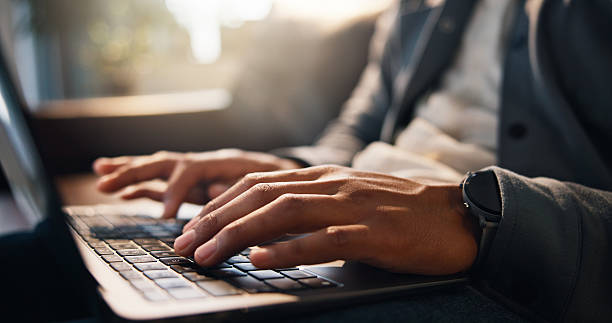 istock Remote work, online and hands with laptop, home or creative for video editing, browsing and project. Freelance, editor and person with tech for post production, digital media or process in house 2234814803