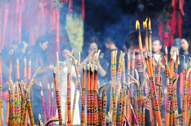 istock Burning incense in Chinese temple 2234815871