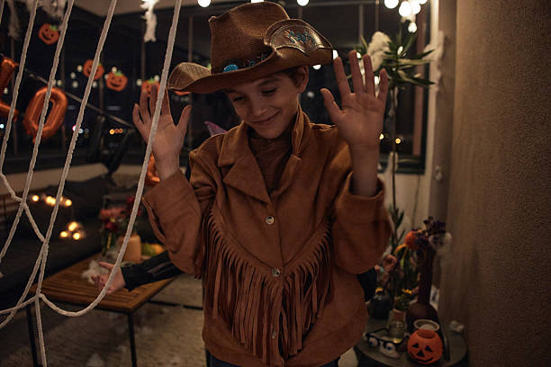 Beautiful boy on Halloween night dressed up in costume.