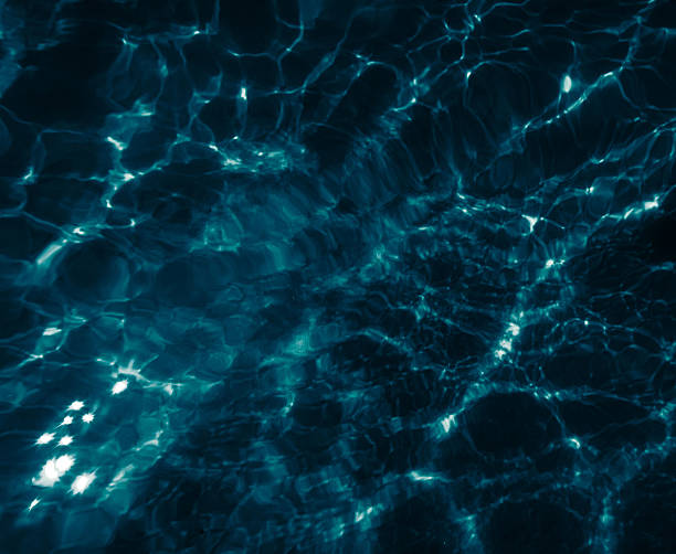 istock dark blue sea water, closeup, top down view 2234818060