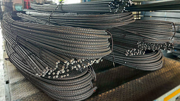 istock Deformed steel bars stacked for construction use, essential reinforcement material for concrete structures, bridges, and industrial building projects. 2234819162