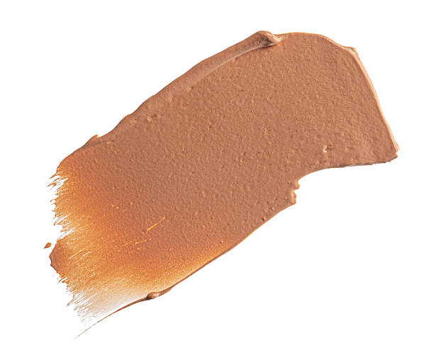 istock Smudged stain of a cream foundation isolated on white 2234820102