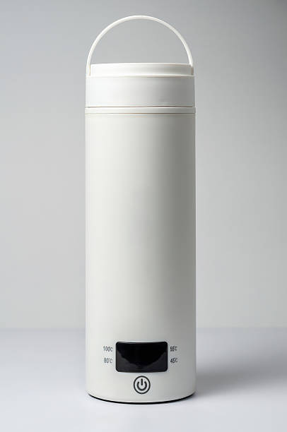 A sleek white smart cup thermos with a digital temperature display for beverages.