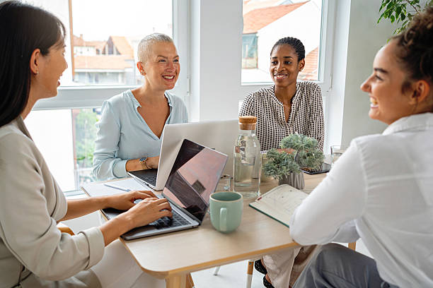 istock Collaborative meeting with diverse businesswomen in a modern, bright office setting 2234831364