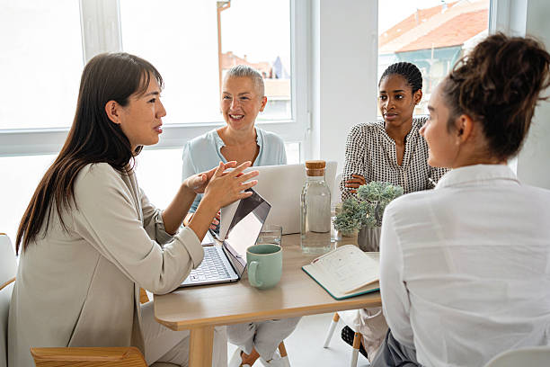 istock Professional Women Collaborating in a Bright Modern Office Workspace 2234831401