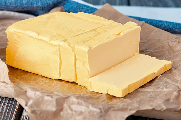 istock Cut butter on plate with blue towel on kitchen table 2234834866