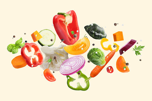 istock Fresh vegetables, herbs and spices in air on beige background 2234837698