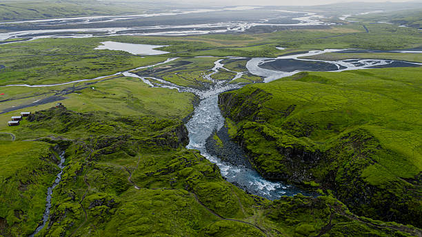 istock Aerial View of Icelandic Gorge, River, and Black Sand Plain 2234840078