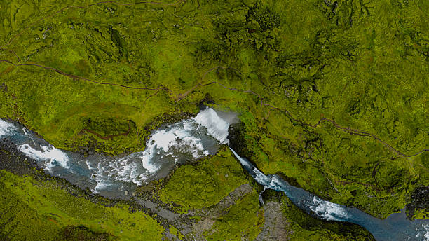 istock Aerial View of Icelandic Waterfall Cascading into a Winding River 2234840169