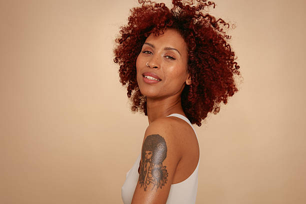 istock Raw and Real Beauty Portrait – Studio, Beige Background 2234840309