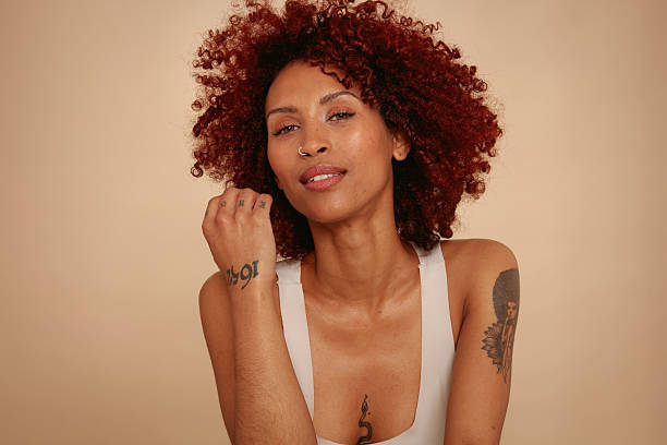 istock Raw and Real Beauty Portrait – Studio, Beige Background 2234840450