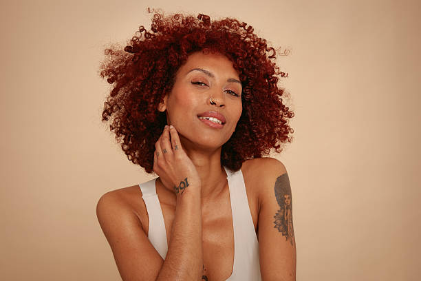 istock Raw and Real Beauty Portrait – Studio, Beige Background 2234840459