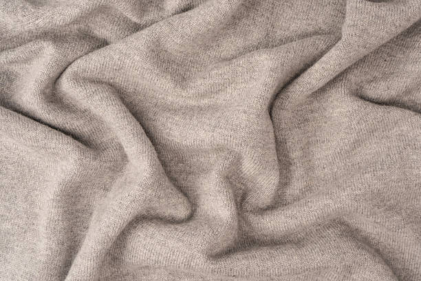 istock Soft grey merino wool sweater texture as a background. 2234841016