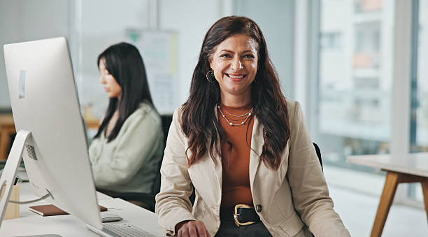 istock Confident Female Professional Smiling at Work in a Bright Modern Office Setting 2234841299