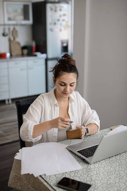istock Female Feeling Happy While Making Online Payment Using Laptop And Credit Card At Home 2234845560