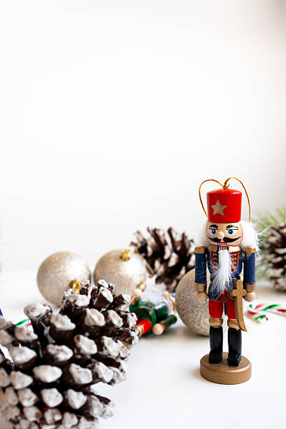 istock Festive nutcracker scene with pinecones and Christmas decorations 2234850552