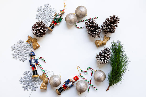 istock Festive Christmas wreath with nutcrackers, pine cones, and golden ornaments 2234850678